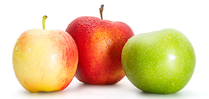 Delicious appetizing beautiful fresh green and two red apples isolated on a white background.